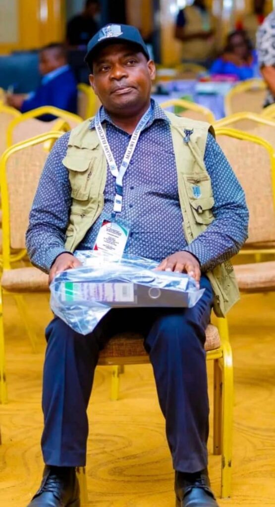 Returning Officer Isaac Mkandawire brought tally sheets to the National Tally Centre in Lilongwe.