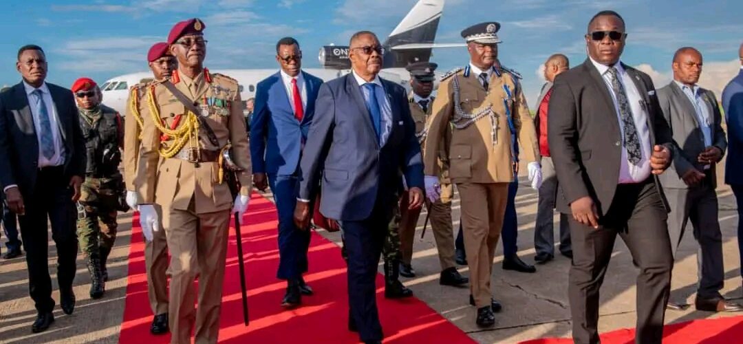 Mutharika back home after calls to cut South Africa trip short