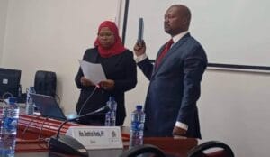 The ongoing Chilima crash probe, capturing the solemn environment of parliamentary testimony and the search for answers.