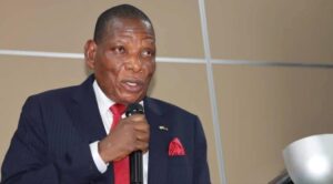 Minister Joseph Mwanamvekha symbolizing fiscal determination as Malawi drafts 5-year economic recovery plan to address public debt.