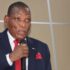 Minister Joseph Mwanamvekha symbolizing fiscal determination as Malawi drafts 5-year economic recovery plan to address public debt.