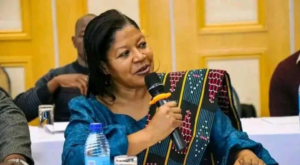 Energy Minister Jean Mathanga representing policy determination and structural commitment as Malawi promises fewer power blackouts through an impending grid boost.